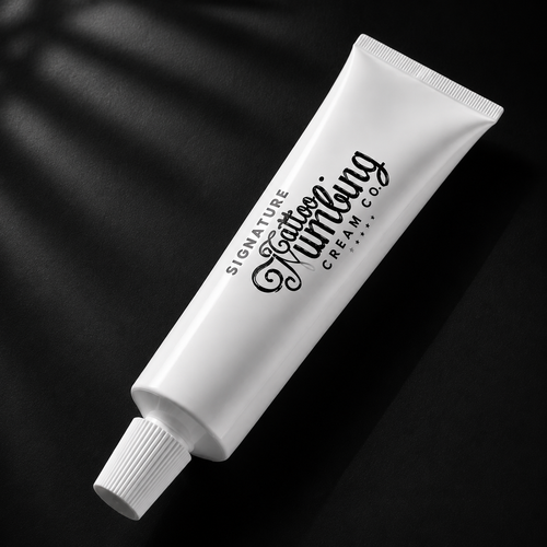 Signature tattoo numbing cream 10g tube beside its retail box