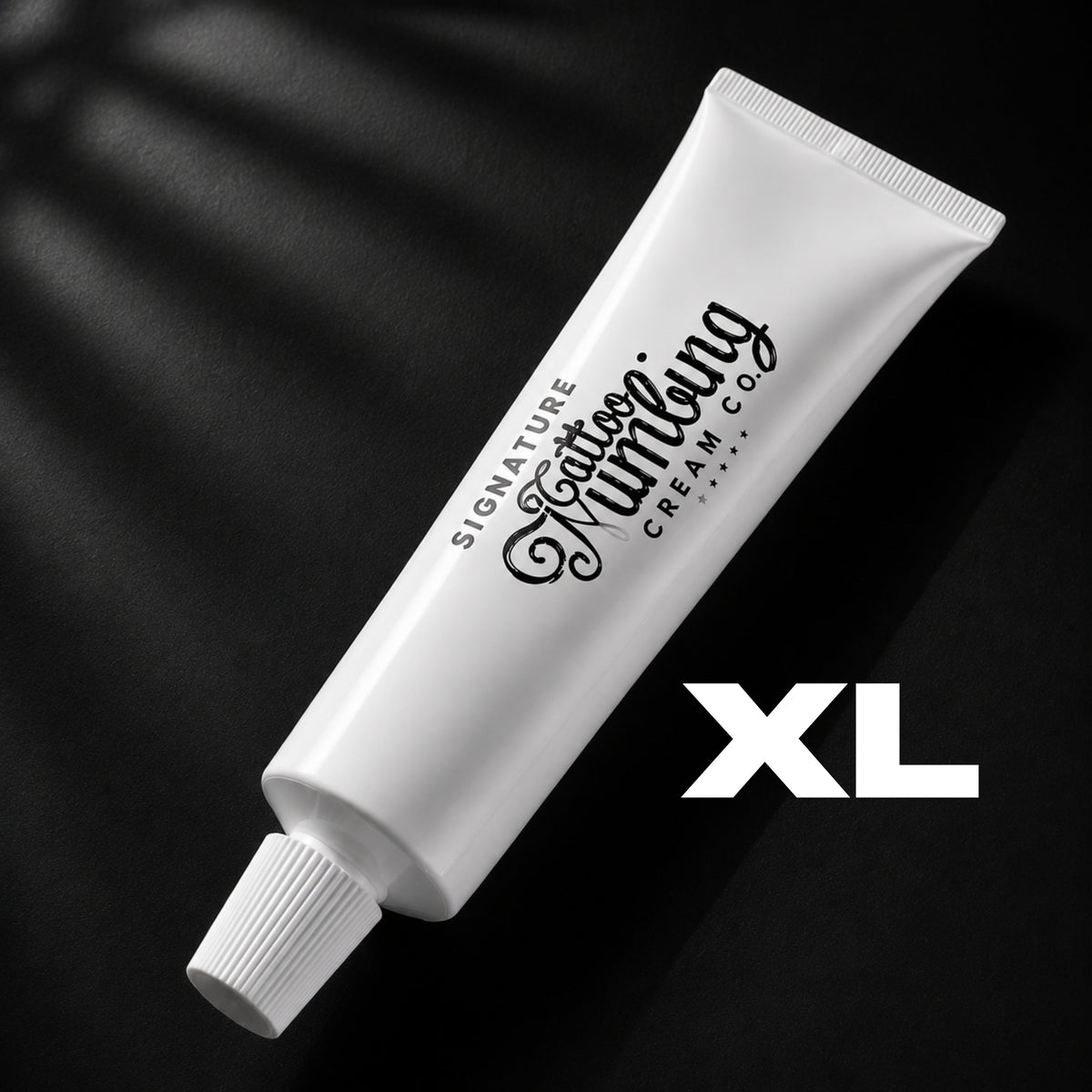 Signature 30g XL tattoo numbing cream in a tattoo studio